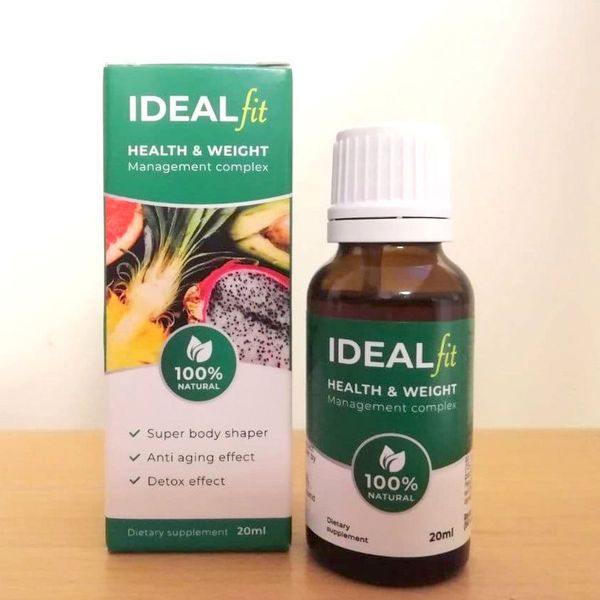 Caja verde de IdealFit y su frasco cuentagotas de 20 ml sobre una mesa de madera