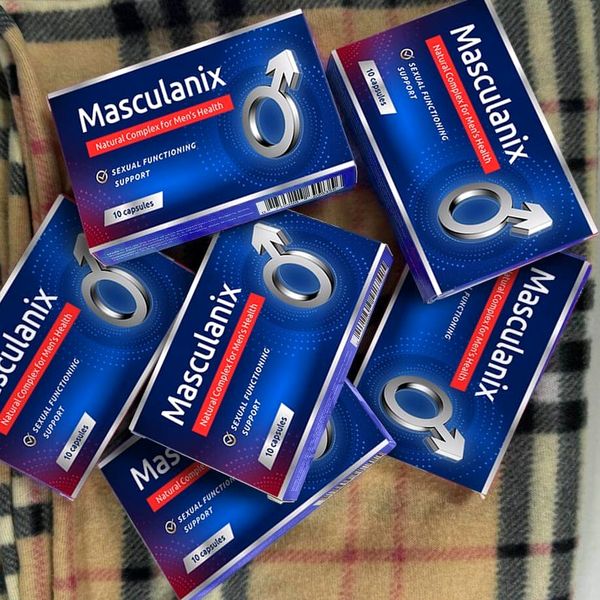 Varias cajas de Masculanix sobre una manta de cuadros