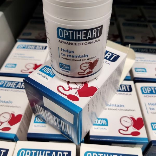 Bote blanco de Optiheart encima de varias cajas del producto