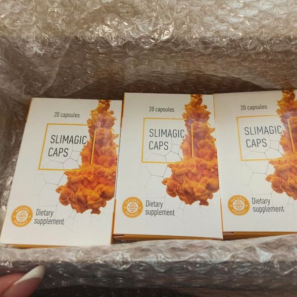 Tres cajas de Slimagic Caps dentro de un paquete