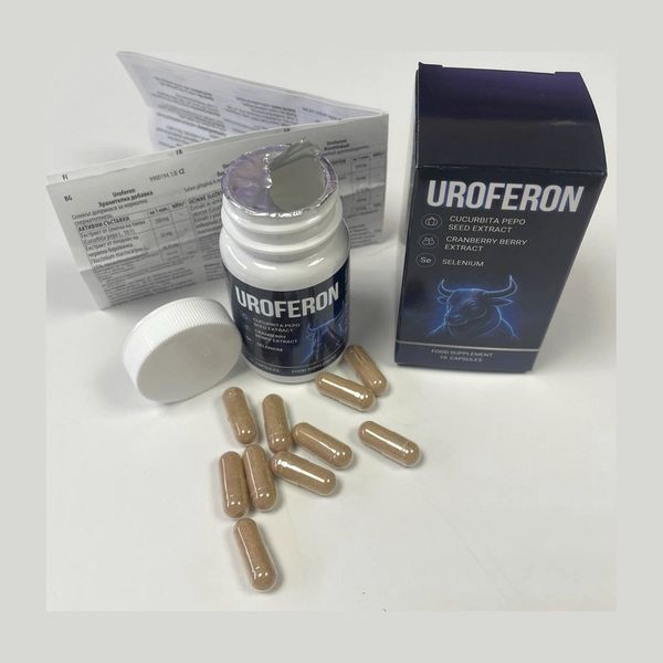 Bote de Uroferon abierto con cápsulas marrones, la caja azul y el prospecto